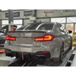 Fits 2017-2023 BMW 530i 540i Sedan 5 Series Rear Bumper Diffuser Lips Body Kits w/ LED Light - Image 2