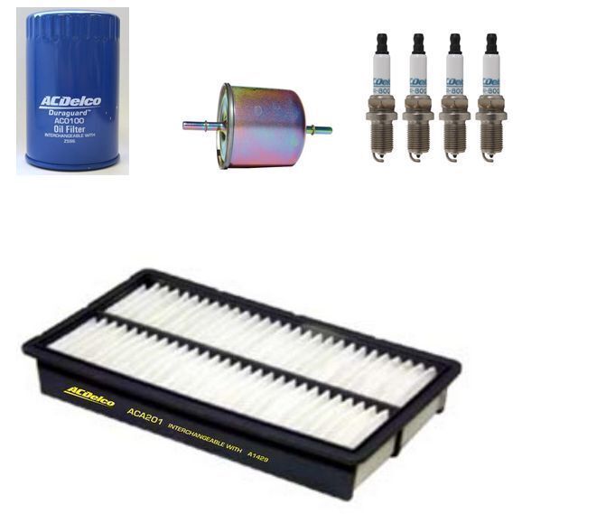 KITac0100-19266360-aca2-1.jpg OIL AIR FUEL FILTERS SPARK PLUGS SERVICE KIT ACDelco suitable for MAZDA TRIBUTE 2001-04 2.0l - Image 1